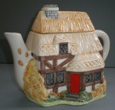 THE VILLAGE TEA POT COLLECTION