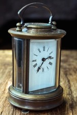 Brass Circular Carriage Clock, Thick Bevelled Edge Glass. With Key