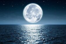 Moon At Night Over Blue Sea