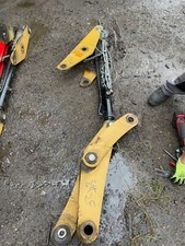 Caterpillar 432F tipping ram