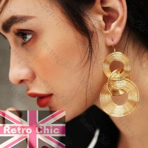 Gold tone coil circle - tone,