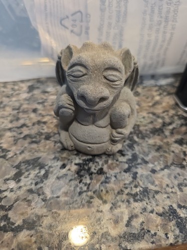 Stone meditating gargoyle - meditating,