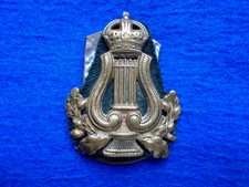 WWII BRITISH  BANDMASTER MUSICIANS BRASS ARM BADGE + BACKING CLOTH & PLATE + PIN