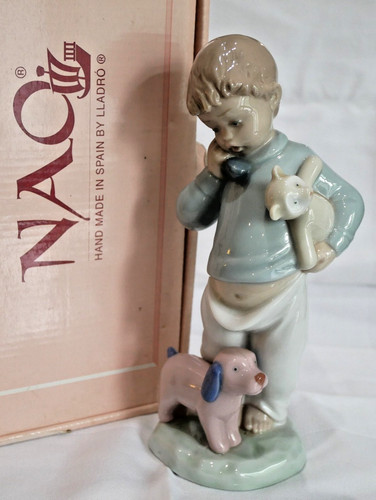 New boxed nao lladro - 1044, boy
