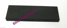 Black Arkansas Stone Fine Sharpening Stone used to Sharpen Tools in plastic tube