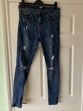 Skinny ripped jeans 32”