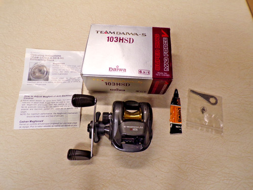 Daiwa fishing reel box - reel,