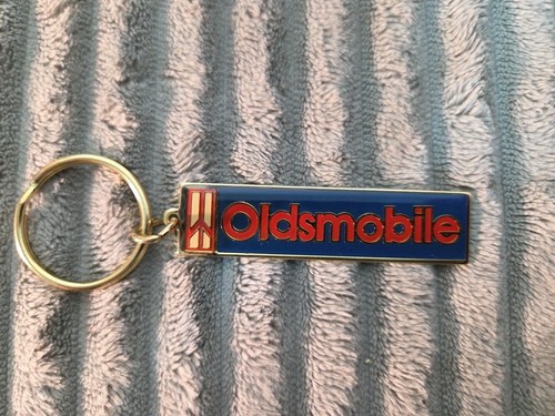 Vtg oldsmobile metal key - 1,