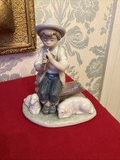 NAO BY LLADRO SHEPHERD BOY SAT ON LOG PLAYING A WHISTLE TO SHEEP FIGURINE