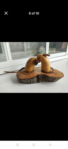 Hand carved hugging - hand,