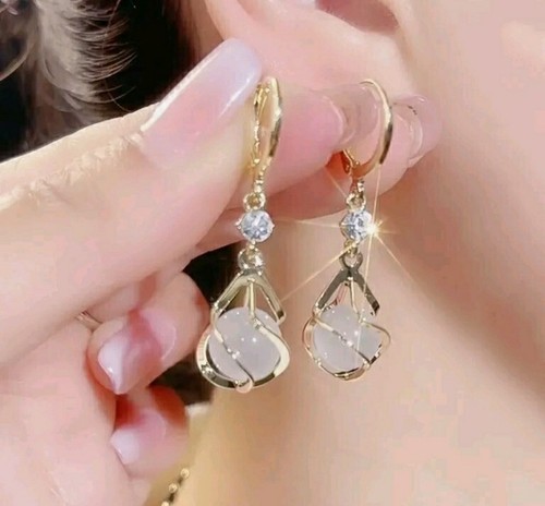 Gold and pearl drop - and,