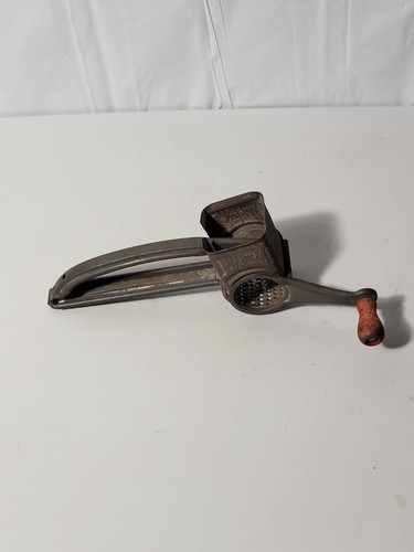 Vintage hand operated metal