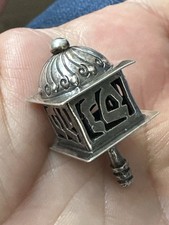 Miniature silver Jewish Dreidel
