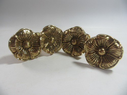 Two pairs brass flower - two, of