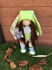  tilda dolls holding handmade dragon 