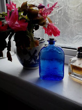 Vintage Cobalt Blue Glass Bottle With Decoration Around The Base.  4.5" Tall.
