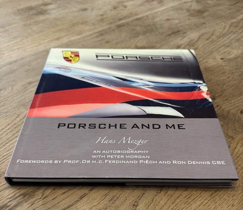 Porsche and book hans - by,
