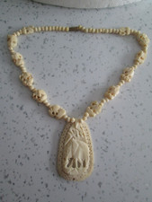 VTG 1950s CARVED FAUX IVORY