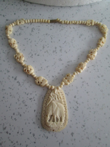 Vtg 1950s carved faux - faux, ivory
