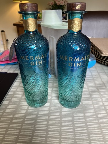 Mermaid gin bottles - gin,