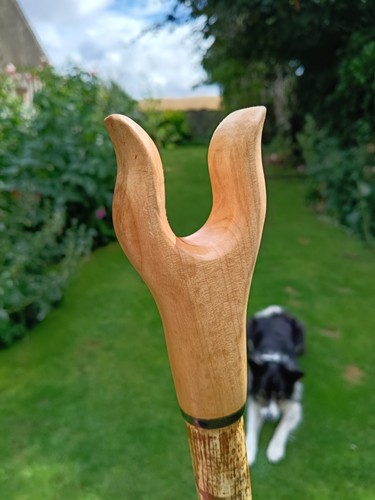Hand carved thumb stick - hand,