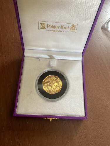Pobjoy mint collectible coin - mint,