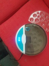 8  EGGS INCUBATOR IS NEW COME IN THE BOX   IS WHITE AND BLUE 