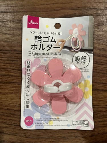 Hair tie holder