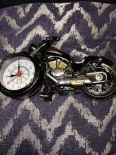 Motorbike With Clock In The Wheel