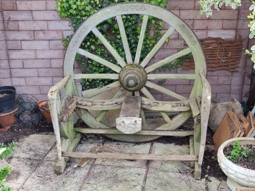 Vintage wooden cart wheel