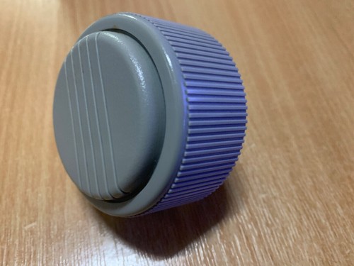 Paper feed platen roller knob - paper,
