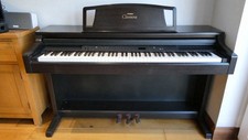 Yamaha Clavinova Model CLP-860 Electric Piano And Stool