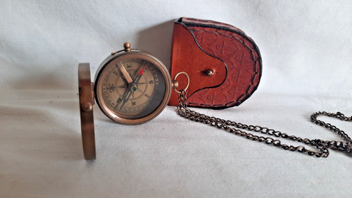 Engraved brass compass a - on,