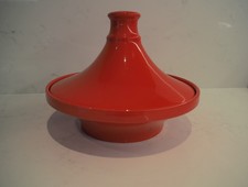Bright red tagine (Moroccan casserole) in excellent condition