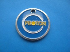 (H) PROTON CADDIE ENAMMALLED  BLUE, YELLOW & SILVER COLOUR TOKEN COIN 
