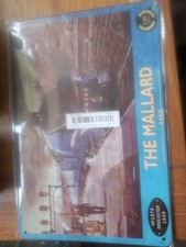 A metal plate with a picture