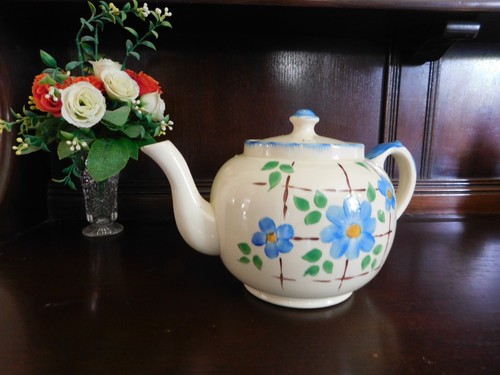 Floral ceramic tea - pot, cream