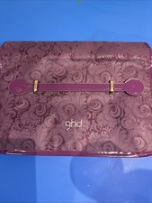 GHD purple limited edition hair straightener set travel bag.