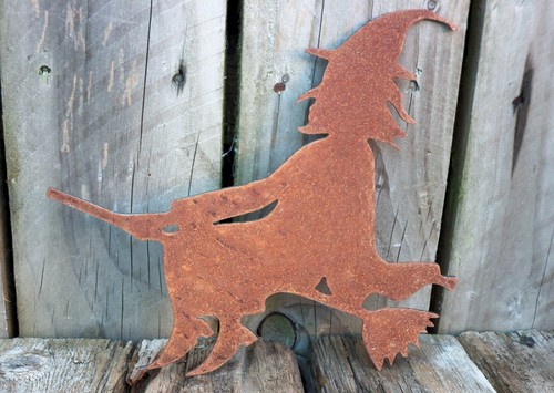 Rusty metal witch a - rusty,
