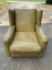 Antique Distressed Leather Winged-Back Arm Chair.