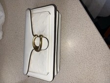 Women’s White Glossy Coach