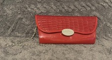 Red patent clutch bag with