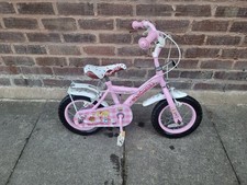 Apollo Cupcake girls first bike, 12" wheels, dolls seat, chain guard, V-brakes