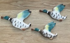A Set Of three flying duck Wall Plaques