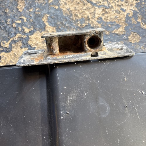 Rear door lower catches - rear,