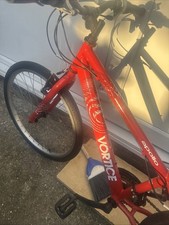 this is red Apollo bicycle in