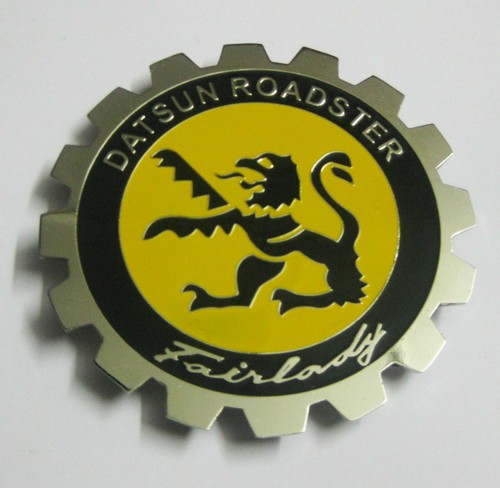 Car badge datsun - car,