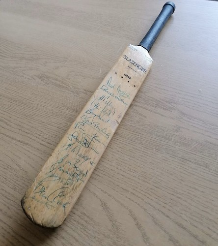 Signed mini cricket - bat,