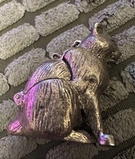 Silver Coloured Metal Sitting