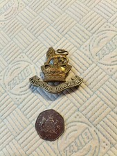 The Royal Dragoons QVC badge with 3 lugs